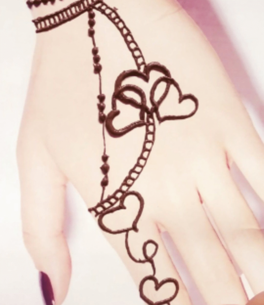 center back heart mehndi design