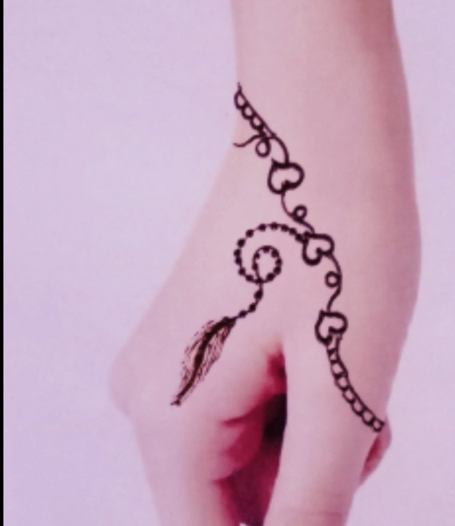 cute back heart mehndi design