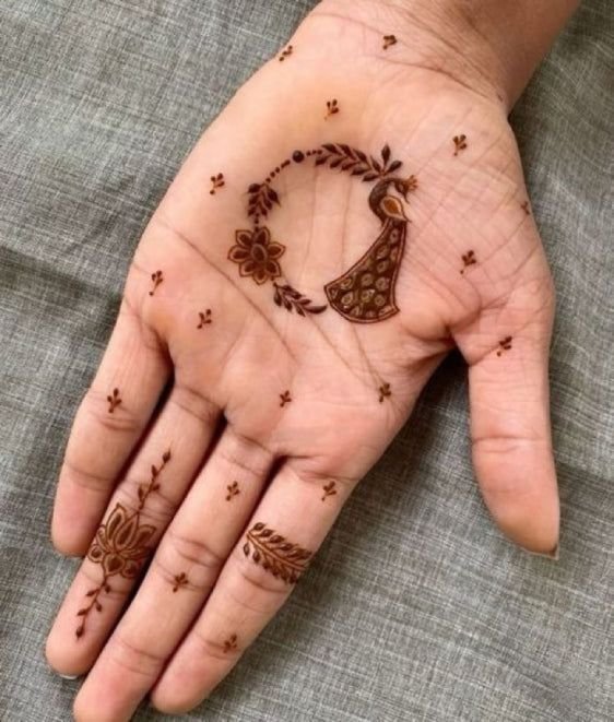 simple floral mehndi design front hand