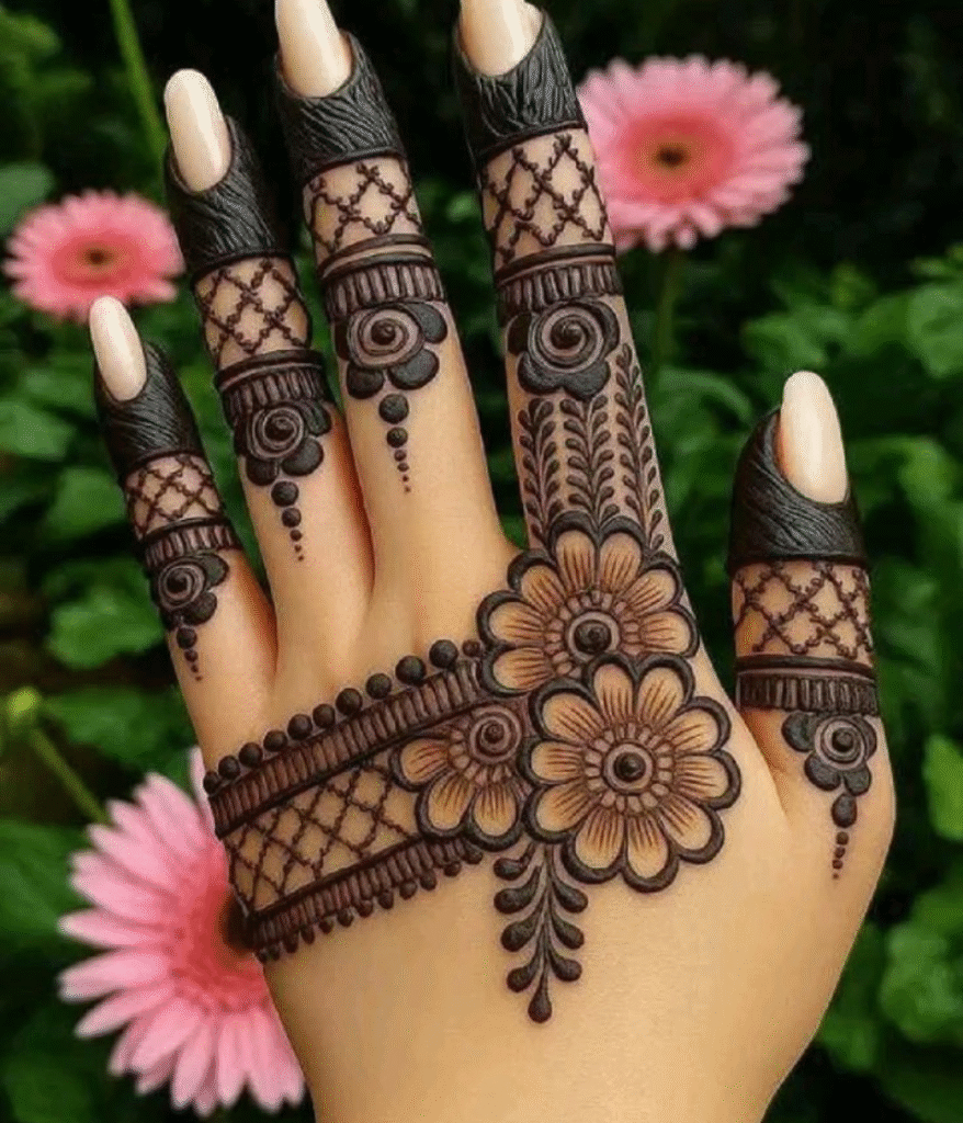 Realistic Floral Designs with 3D Effect

Realistic floral 3D mehndi designs make the flowers look raised and natural. The bold lines and soft shading create a beautiful depth that stands out on the hands. These patterns give a modern and stylish touch perfect for any event.